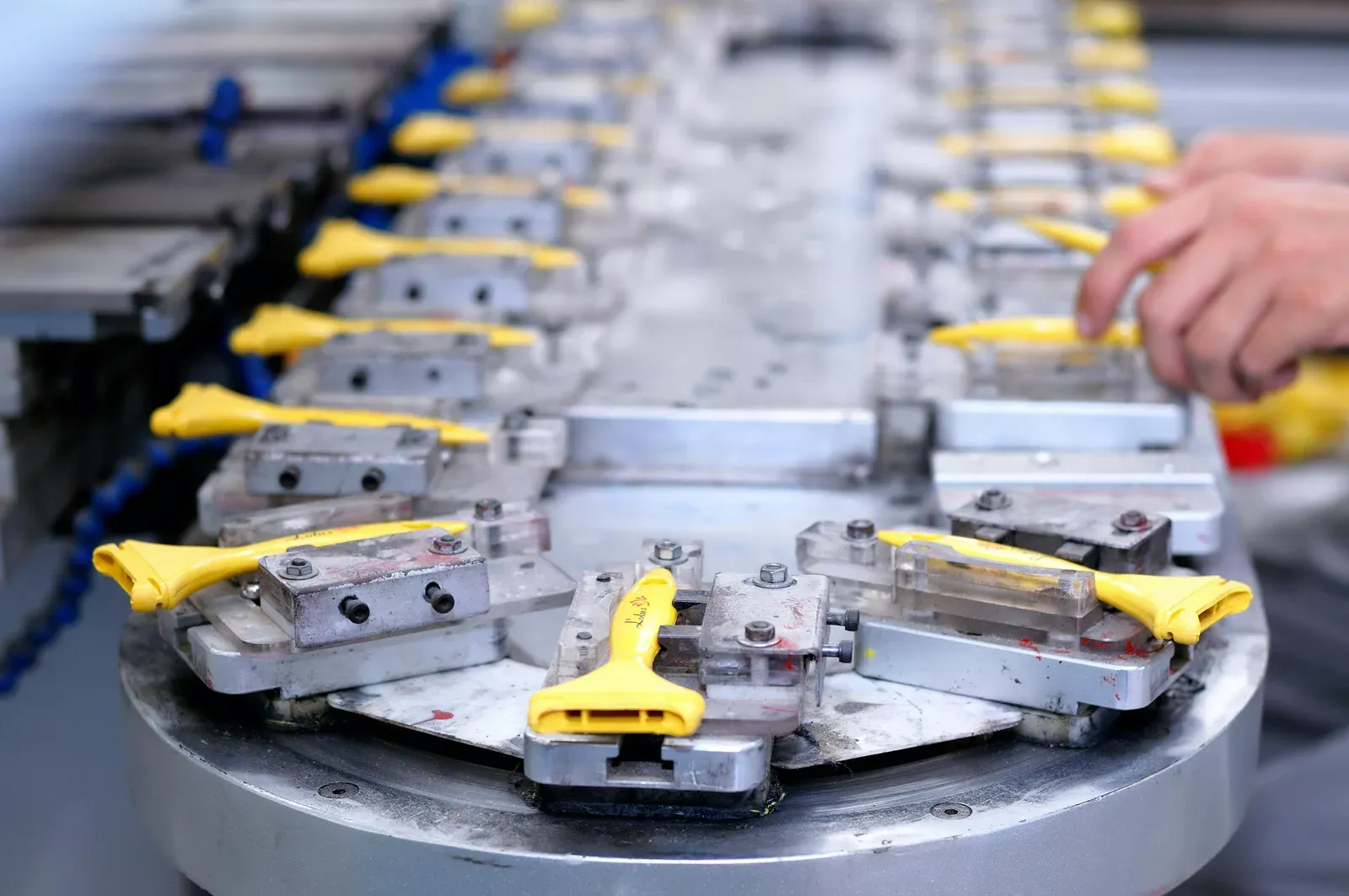 Technician assembling an unmanned aircraft in a manufacturing facility