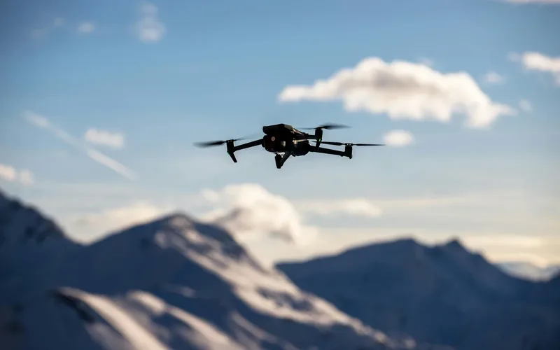 Commercial drone flying beyond visual line of sight over open terrain