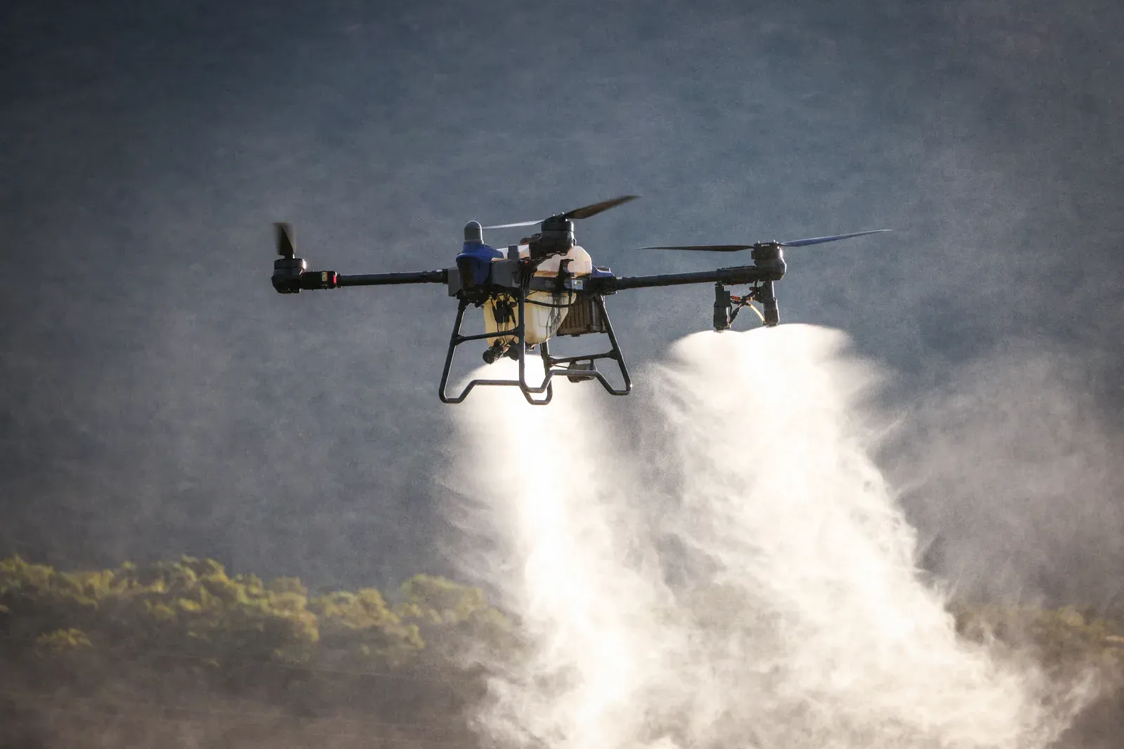Large domestic agricultural spray drone parked on a farm