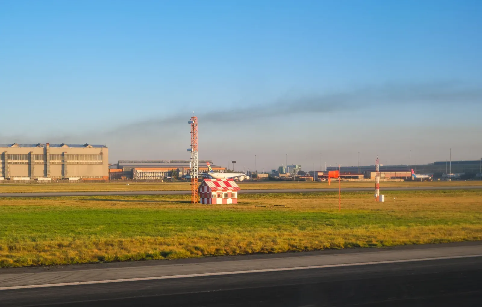 Radar antenna installed along an airport perimeter fence
