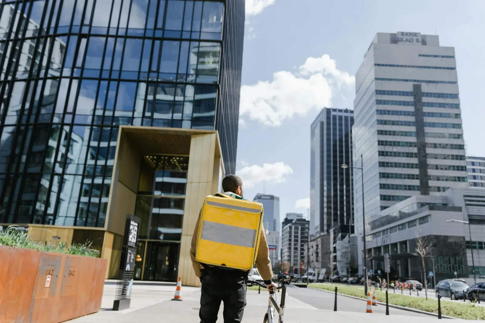 Autonomous delivery drone flying over an urban environment