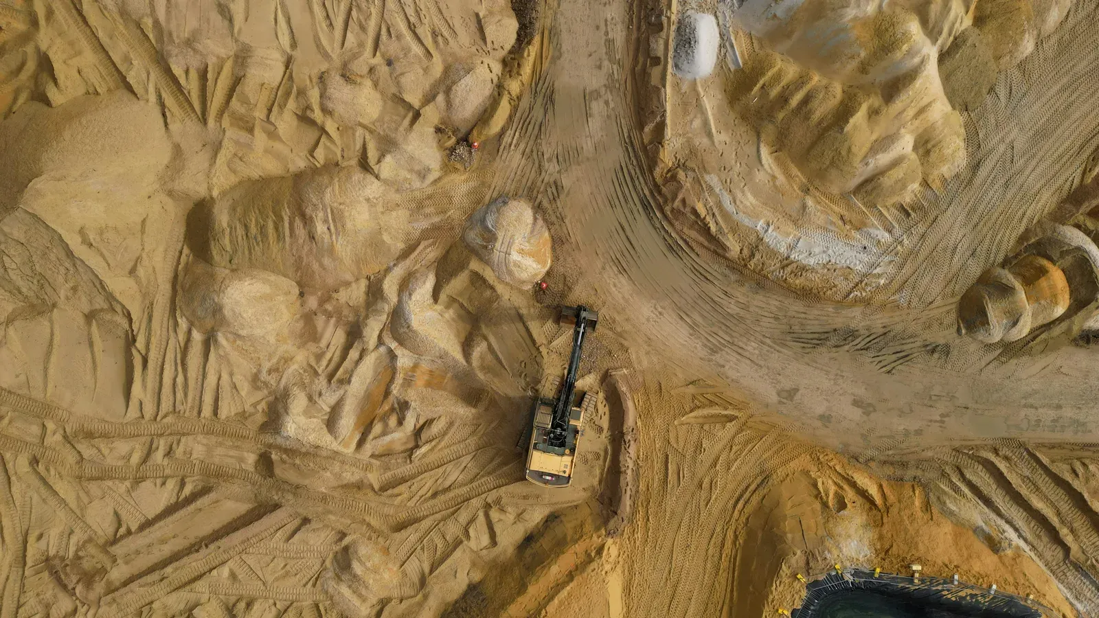 Professional RTK survey drone flying over a construction site for mapping