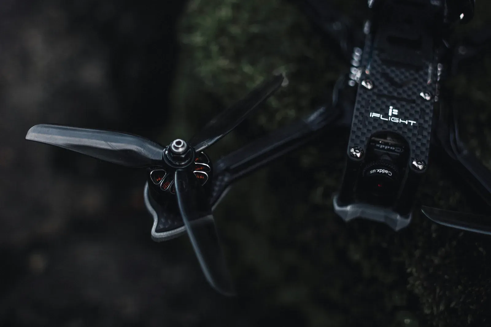 Close-up of a first-person-view quadcopter drone with exposed propellers