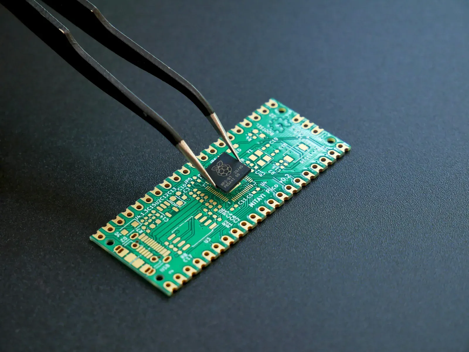 Close-up of a drone's internal circuit board and camera sensor